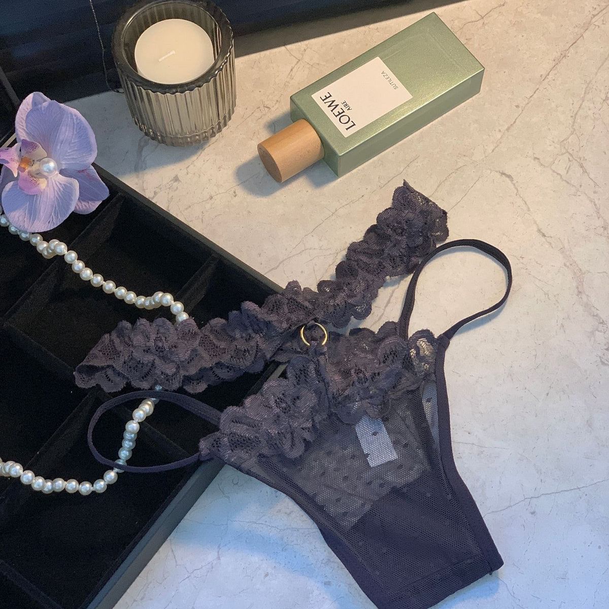 Rasili — Ruffled Lace Thong with Ring Detail