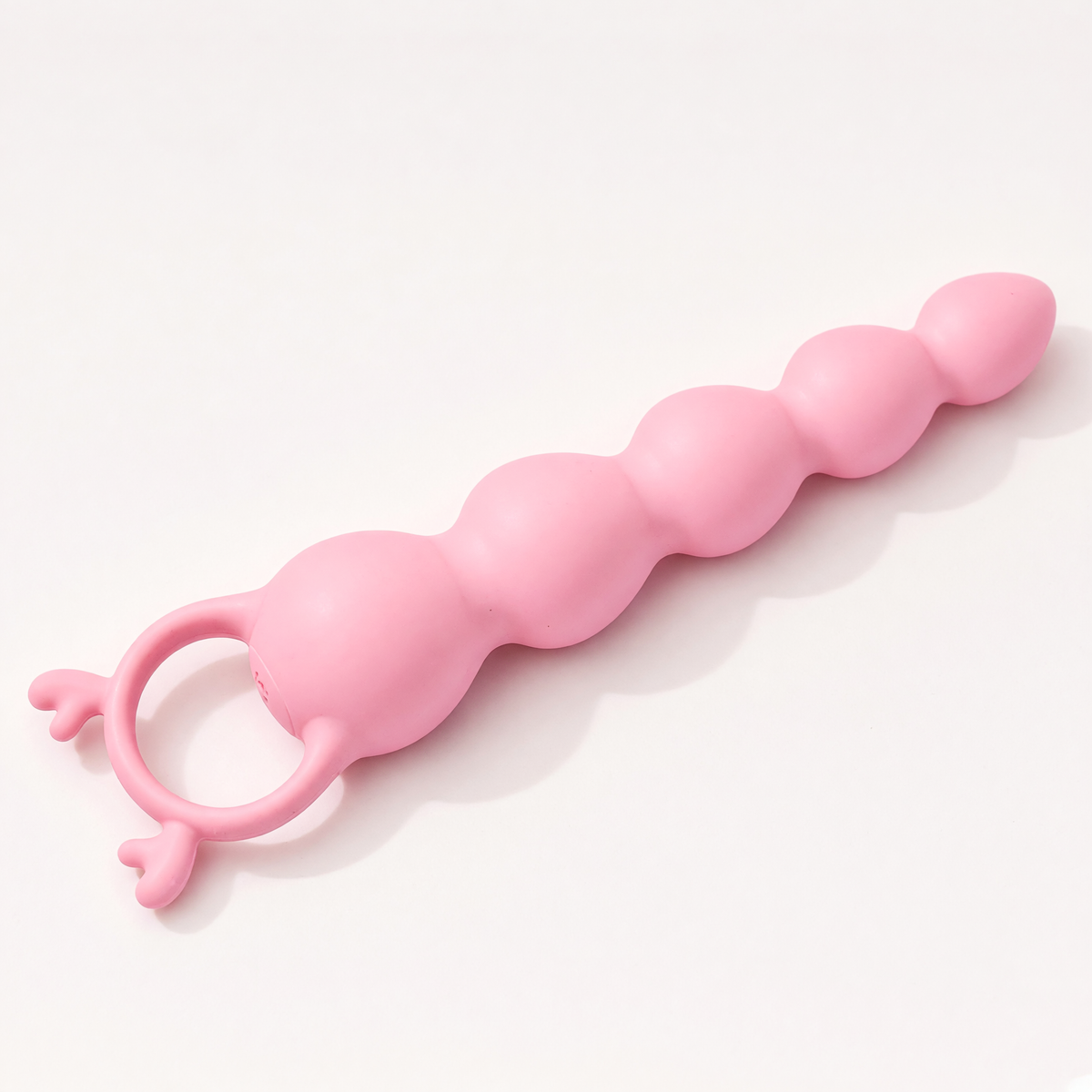 Hirni massager full-length view in soft pink