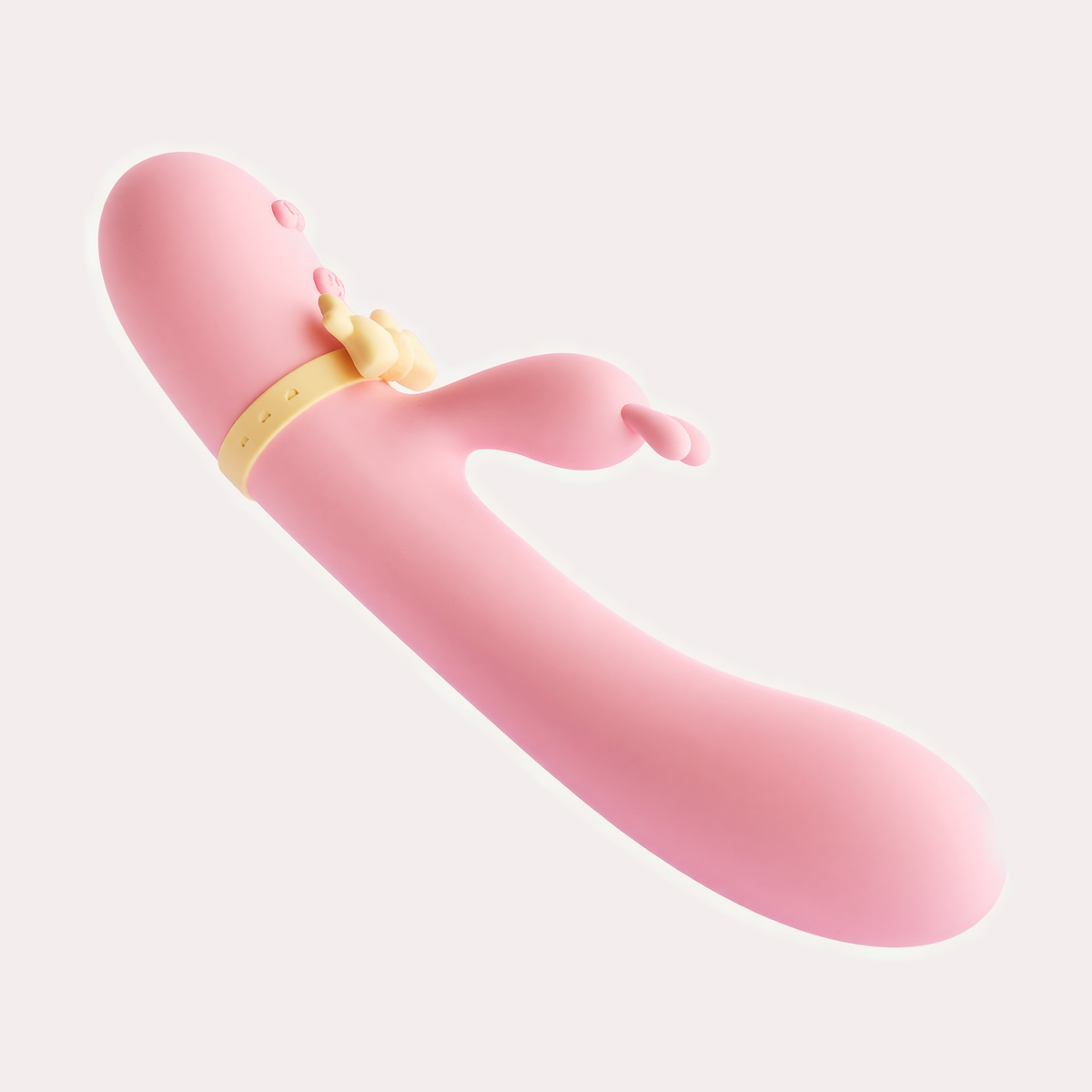 Jhankaar massager at an angle, curved arm, bunny ears and yellow bow