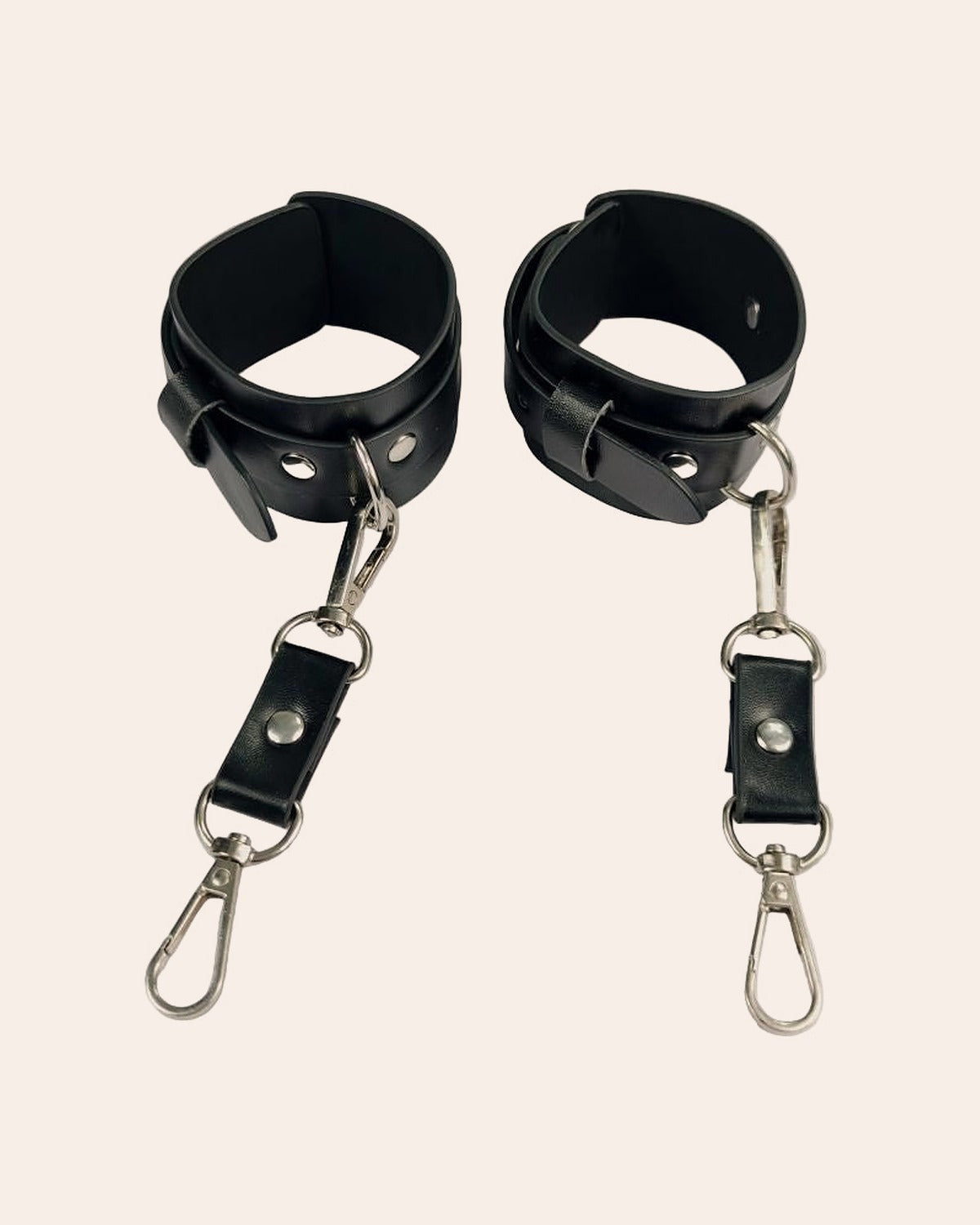 Qaid black faux-leather handcuffs with silver clip hooks