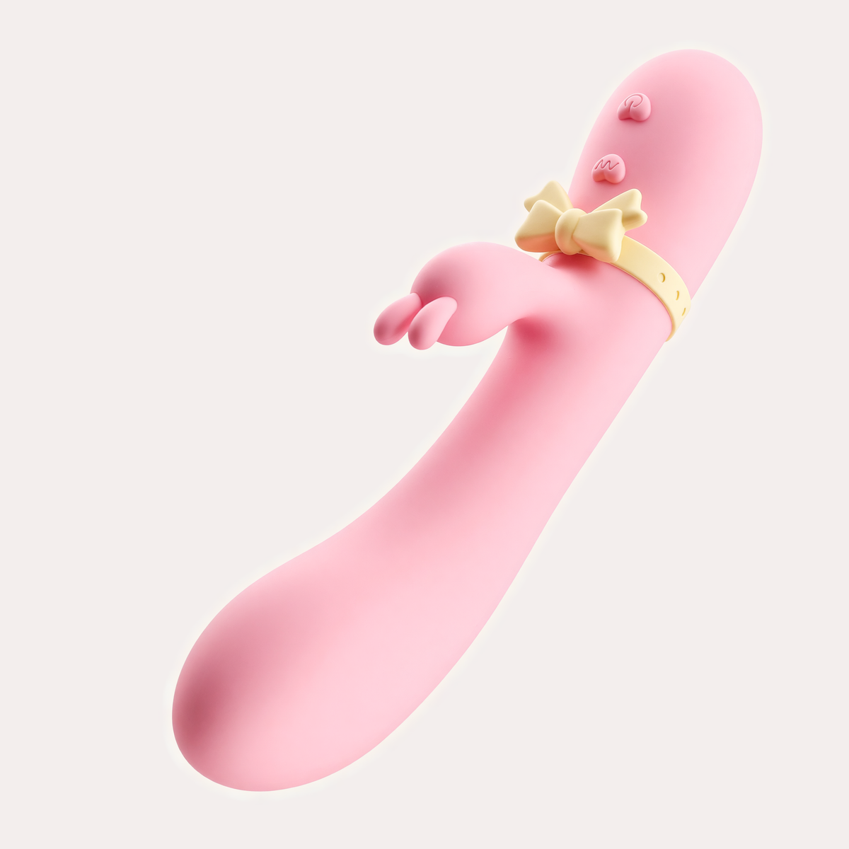 Jhankaar massager at an angle, buttons and bow ring in view
