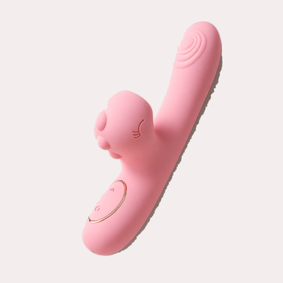 Garmahat warming massager lying flat, curved arm and suction head